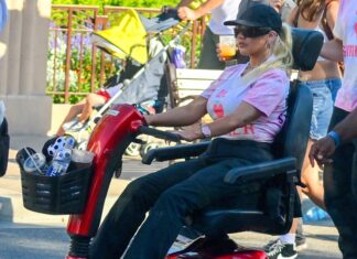 Christina Aguilera Rides Electric Wheelchair Around Disneyland Park
