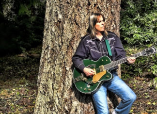 Rusty Reid shares single “Our Love’s With You”
