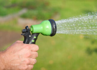 Dr. Duroseau guests attacked with water hose by white neighbor