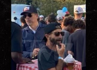 Hunter Biden Grabs Pizza With Son Beau Hours Before Gun Charges