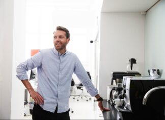 What Is Coffee Badging? Hybrid Workplace Trend Gaining Steam