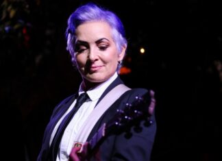 Watch Jane Wiedlin From The Go-Go’s Perform ‘Our Lips Are Sealed’ at Musack Event