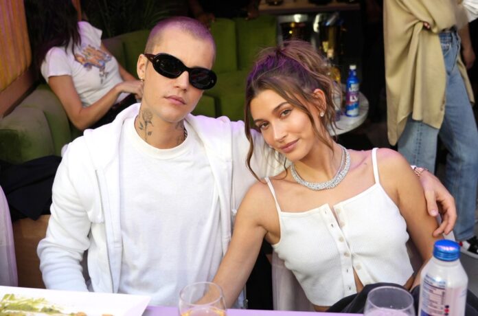 Justin-Bieber-and-Hailey-Bieber-superbowl-2022-billboard-1548.jpg