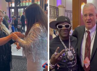 Taylor Swift's Parents Trade Friendship Bracelets with Fans at 'Eras' Premiere