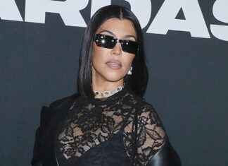 Kourtney Kardashian Rocks Fishnet Dress and Cradles Baby Bump: Photos – Hollywood Life