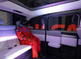 NASA shows off astronauts’ EV ride to Artemis II launchpad