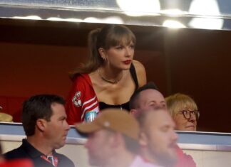 Taylor Swift Cheers on Travis Kelce in Kansas City Chiefs Windbreaker: Where to Buy It Before It’s Gone