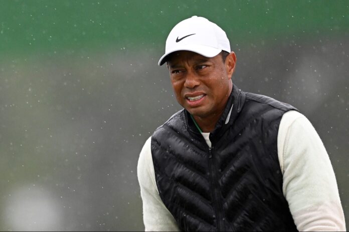 1700592917-tiger-woods-tgl-delay-GettyImages-1480807583.jpg