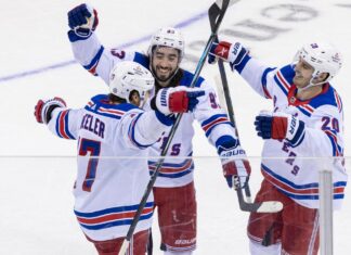 Rangers show rival Devils that this year is different