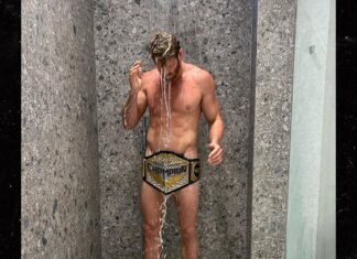 Logan Paul Takes Steamy Shower With New WWE U.S. Championship Belt