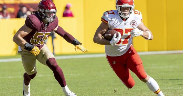 Cole_Holcomb_chasing_Travis_Kelce_OCT2021_cropped-e1699037975131.jpg