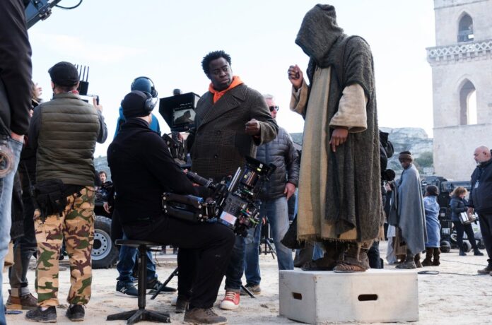 THE-BOOK-OF-CLARENCE-bts-cr-Moris-Puccio-billboard-1548.jpg