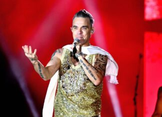Robbie Williams concertgoer fighting for her life after fall during show