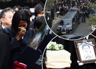 ‘Parasite’ star Lee Sun-kyun’s wife cries at private funeral