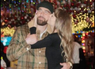 Taylor Swift is Pictured Planting Huge Kiss on Travis Kelce