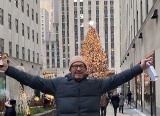 Hugh Jackman Receives Warning From Security Guard at Rockefeller Center
