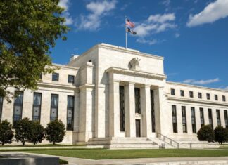 The Fed holds rates steady at final meeting of 2023