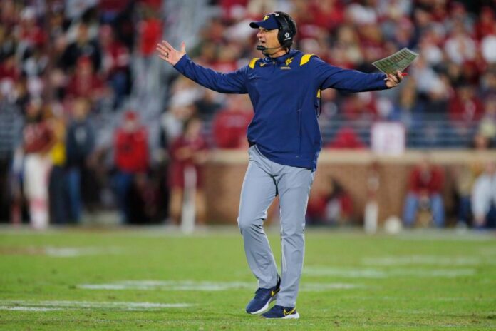 Head-coach-Neal-Brown-of-the-West-Virginia-Mountaineers-e1703637914190.jpg