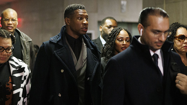 jonathan-majors-meagan-good-hold-hands-ftr.jpg