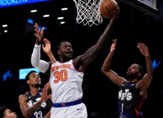 Knicks roll past rival Nets to end road trip on high note