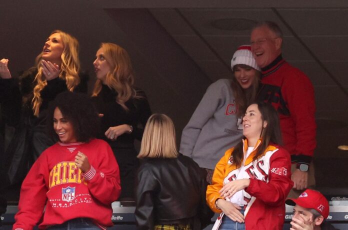 taylor-swift-scott-swift-chiefs-patriots-dec-17-2023-billboard-1548.jpg