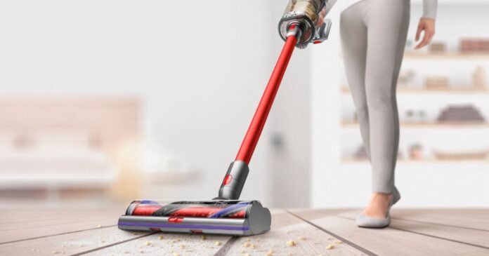 woman-vaccuming-floor-with-dyson-v11-outsize-total-clean-cordless-vacuum.jpg