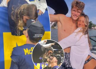 J.J. McCarthy kisses girlfriend after winning national championship