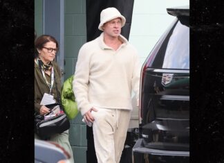 Brad Pitt Flexes Gen-Z Era Look in Bucket Hat, Crocs