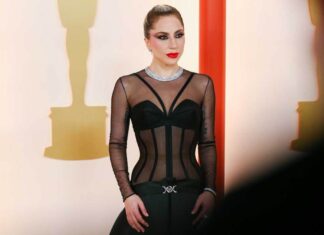 Lady Gaga Wears Car Part Dress, Reveals She Played Five Shows With COVID at ‘Gaga Chromatica Ball’ L.A. Movie Premiere