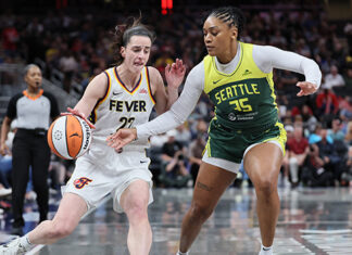 Caitlin Clark and Victoria Vivians Have Intense Moment at WNBA Game – Hollywood Life