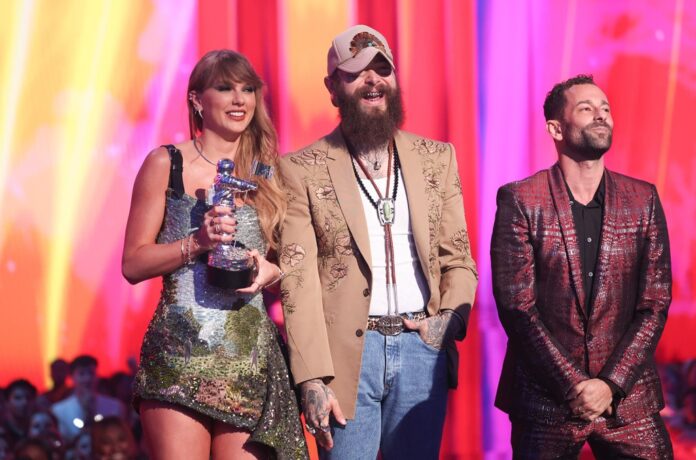 taylor-swift-post-malone-vmas-win-2024-billboard-1548.jpg